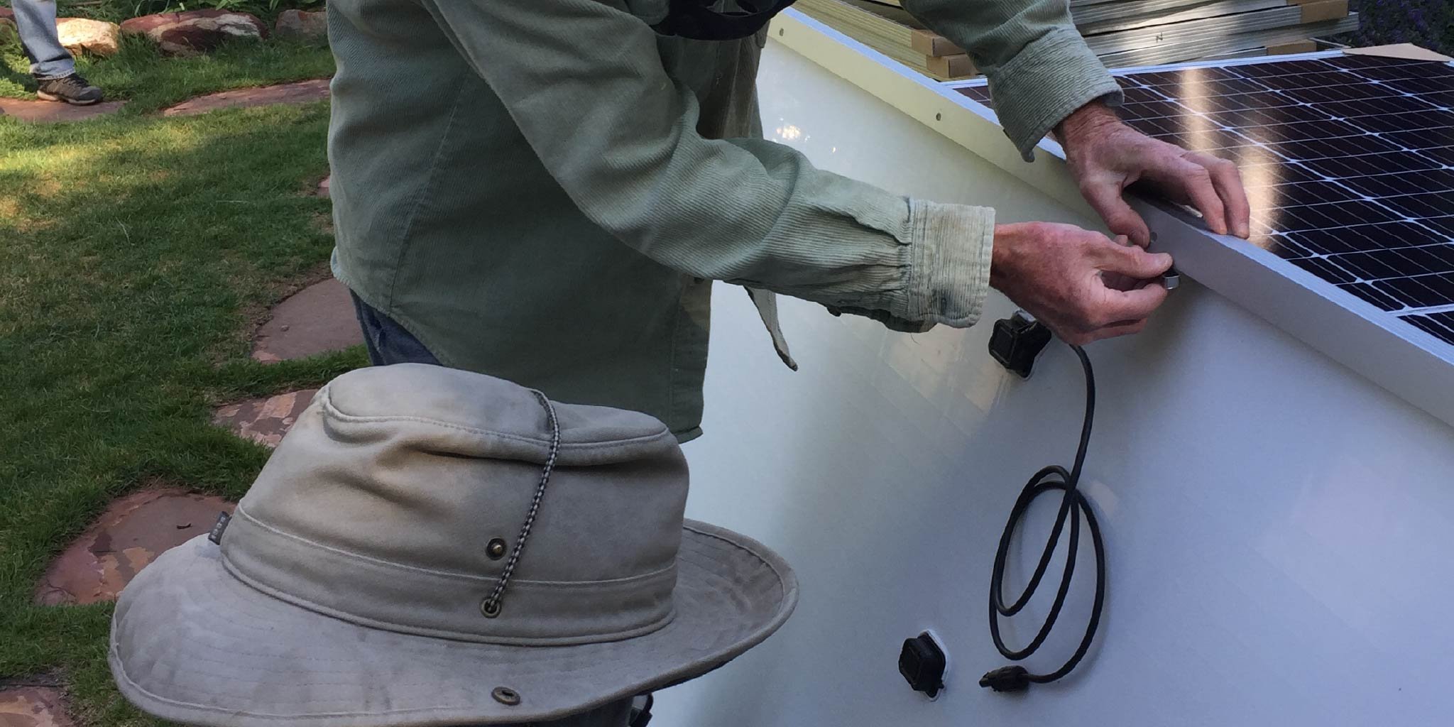 contractor demonstrating solar PV installation